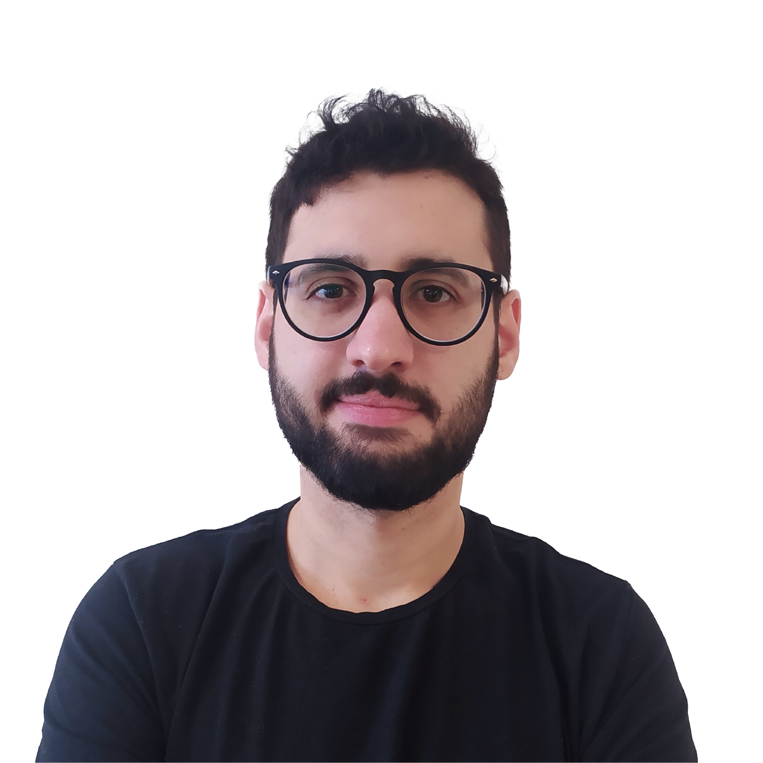 Headshot of a young bearded man wearing glasses looking directly at the camera.